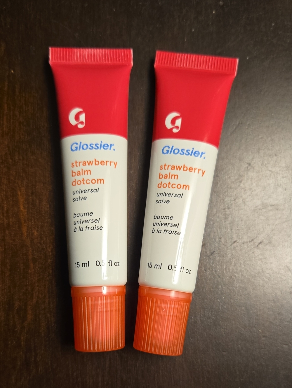 Glossier Strawberry Balm Dotcom